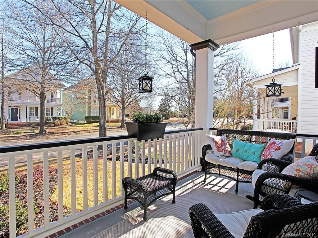 3015 Colonel Springs Way Fort Mill, SC 29708 - Photo 4 of 36 a view of a chairs and tables in the balcony