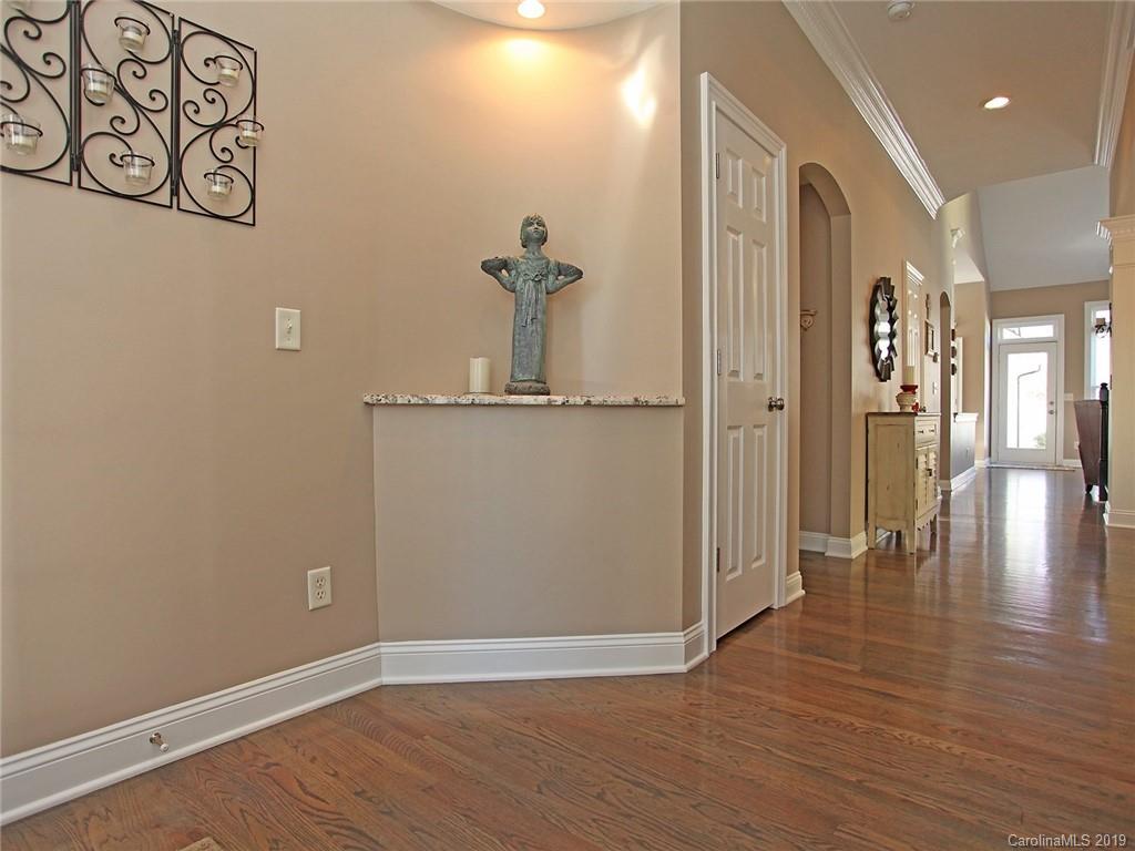 3015 Colonel Springs Way Fort Mill, SC 29708 - Photo 8 of 36 a view of a hallway with wooden floor