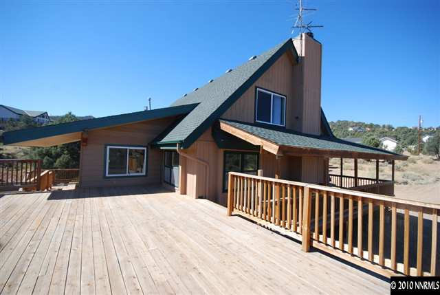 1885 Empire Road Reno, NV 89521 - Photo 12 of 13 a view of a house with a deck