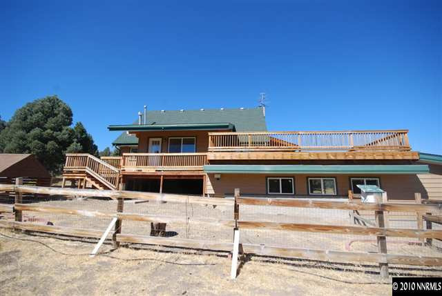 1885 Empire Road Reno, NV 89521 - Photo 10 of 13 a front view of a house with a porch