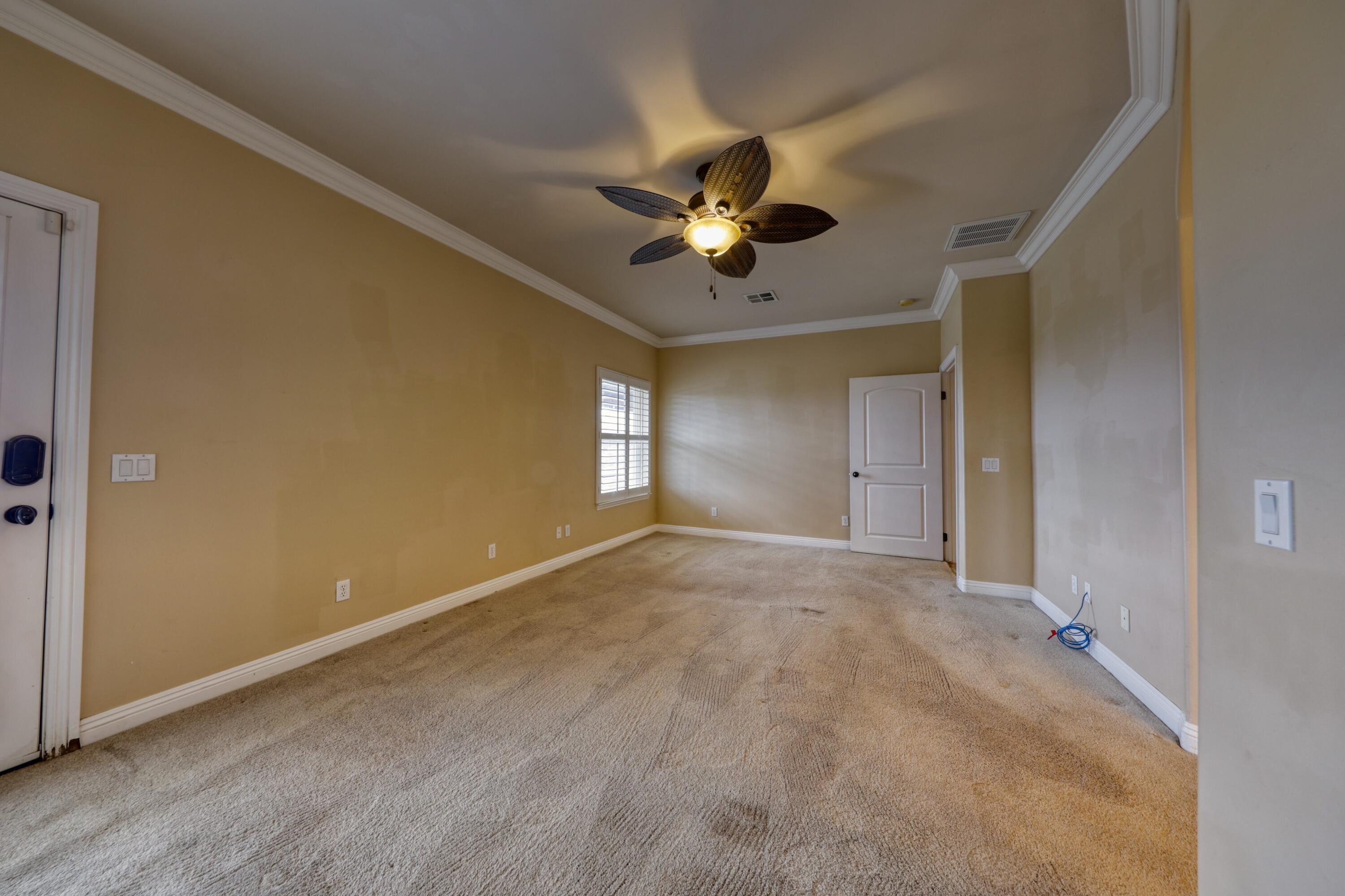 24281 Jacaranda Drive Tehachapi, CA 93561 - Photo 15 of 54 a view of an empty room with a window