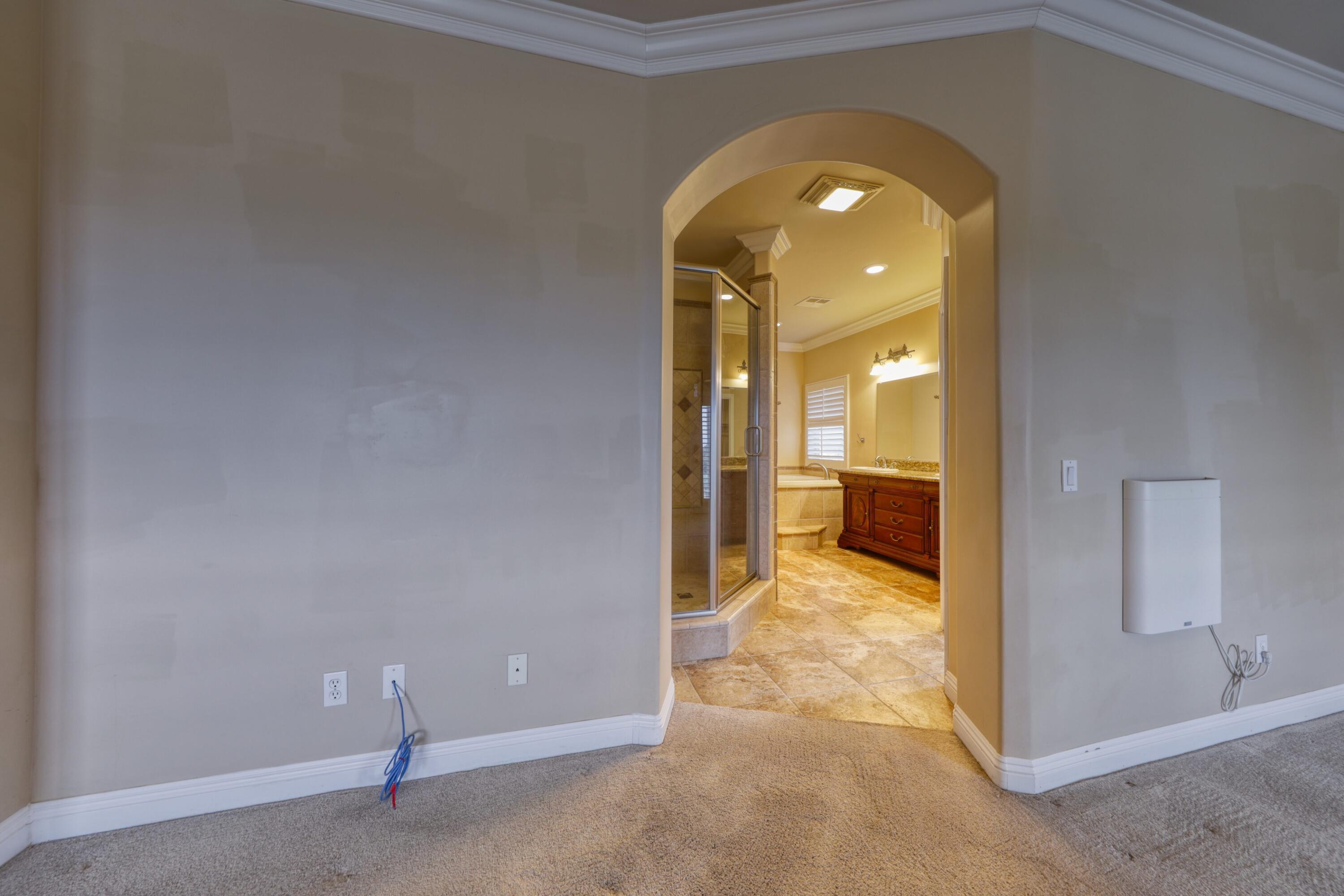 24281 Jacaranda Drive Tehachapi, CA 93561 - Photo 17 of 54 a view of a hallway with a living room
