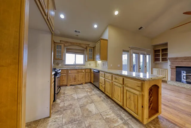 a large bathroom with a large tub and sink
