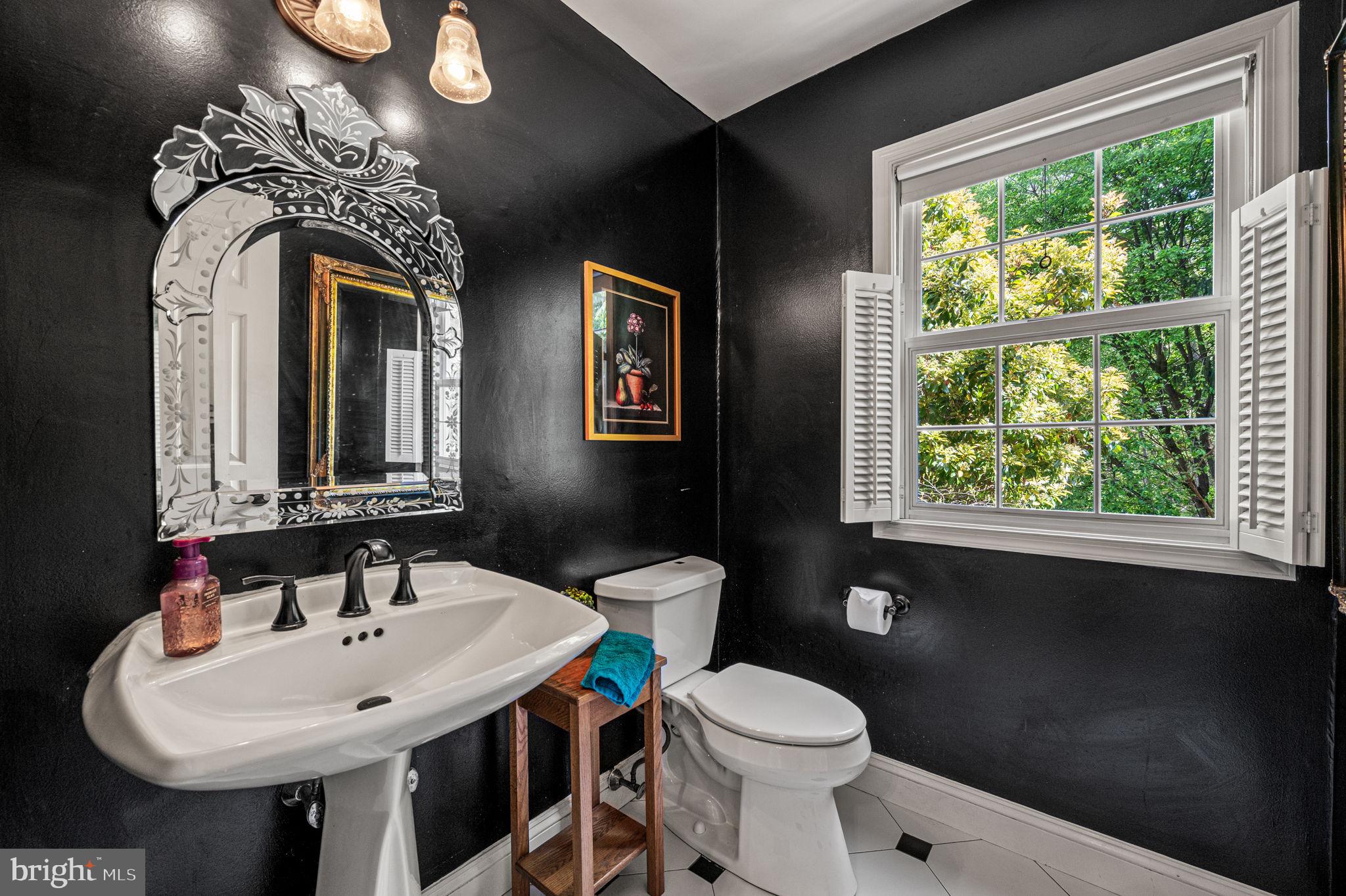 4 Queens Court Landenberg, PA 19350 - Photo 24 of 71 a bathroom with a toilet a sink and a large mirror