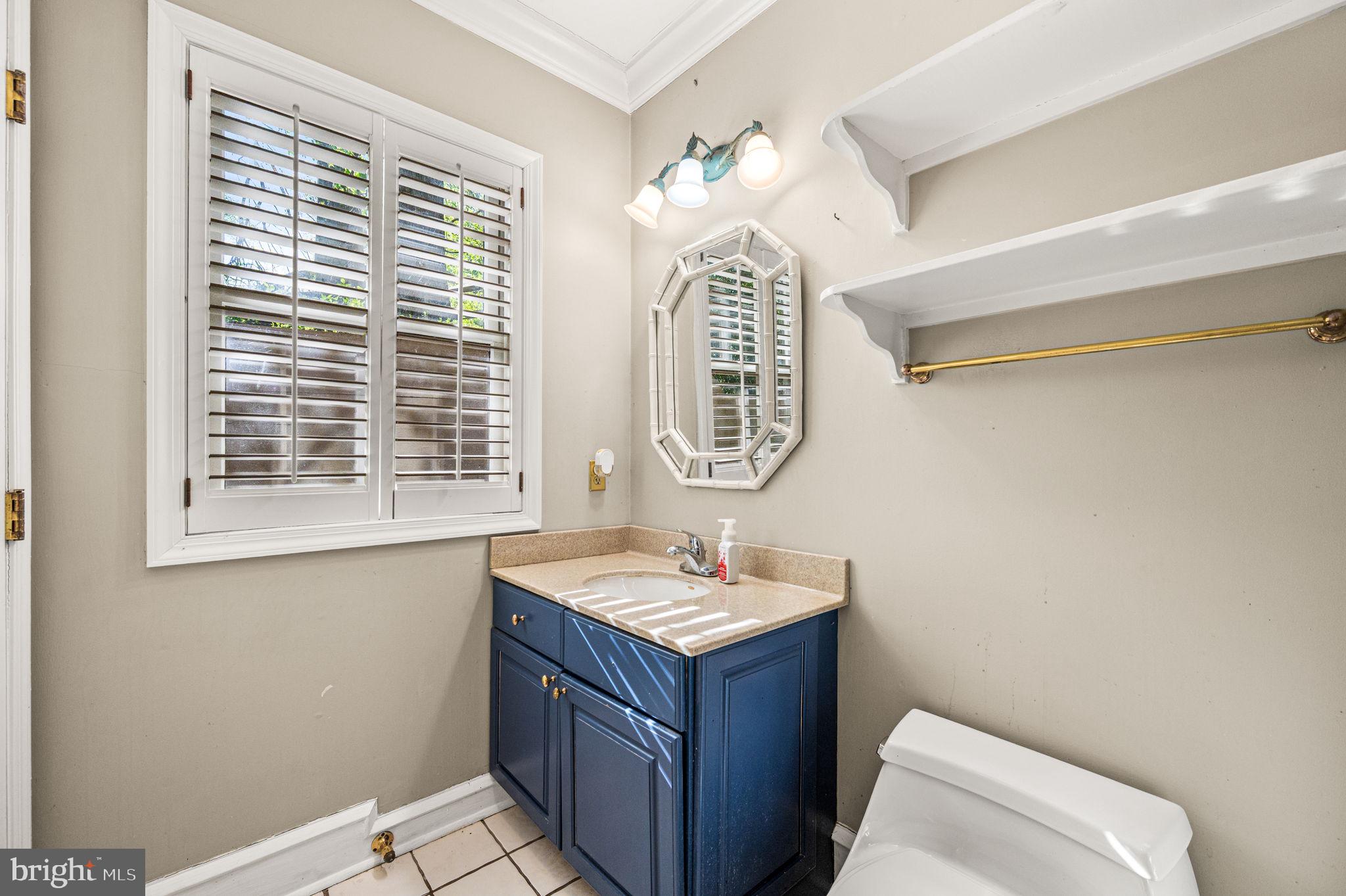 4 Queens Court Landenberg, PA 19350 - Photo 50 of 71 a bathroom with a sink and a mirror