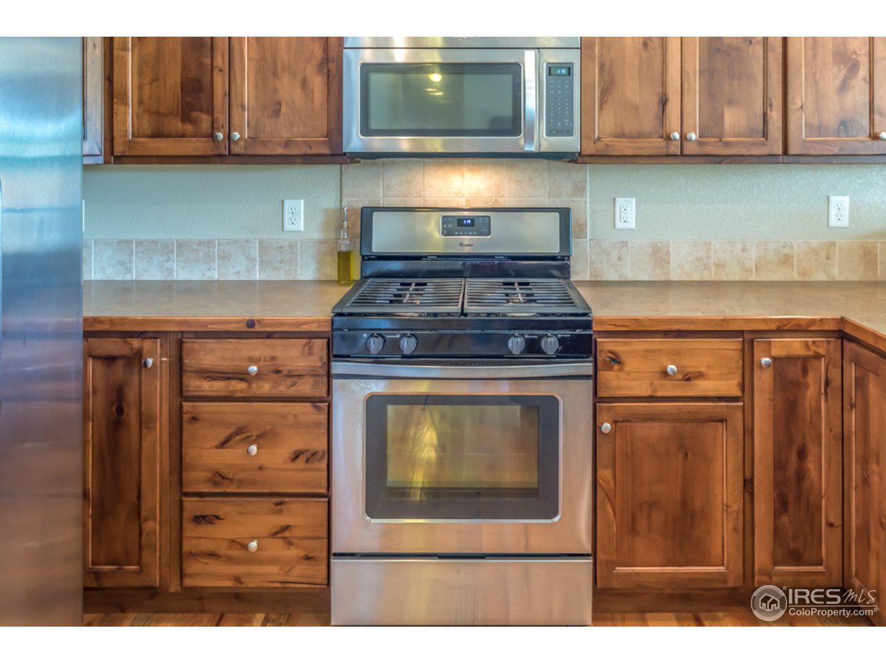 2769 Pleasant Valley Road Fort Collins, CO 80521 - Photo 10 of 40 Alder Cabinets and Stainless Appliances