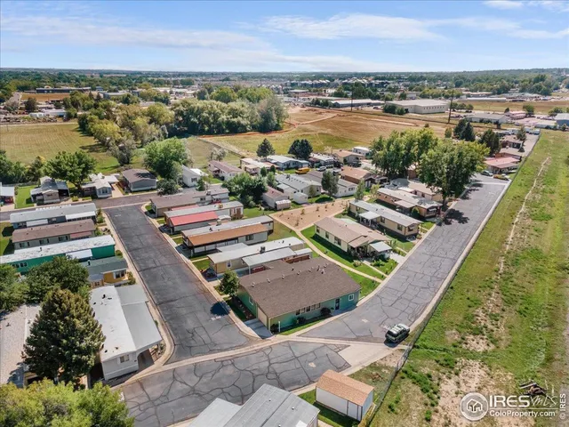 a view of a porch with wooden floor