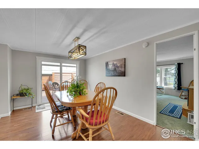 a view of living room with furniture and a window