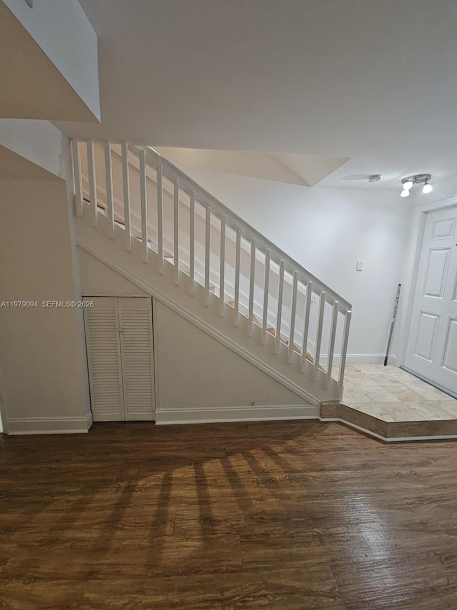 7870 Southwest 102nd Lane Miami, FL 33156 - Photo 14 of 41 a view of entryway with wooden floor