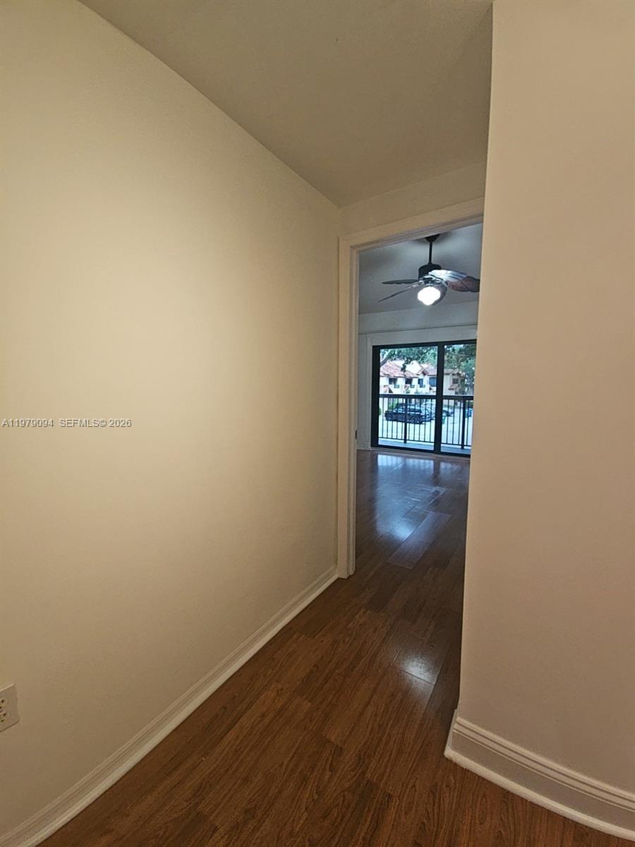 7870 Southwest 102nd Lane Miami, FL 33156 - Photo 18 of 41 a view of gallery with wooden floor