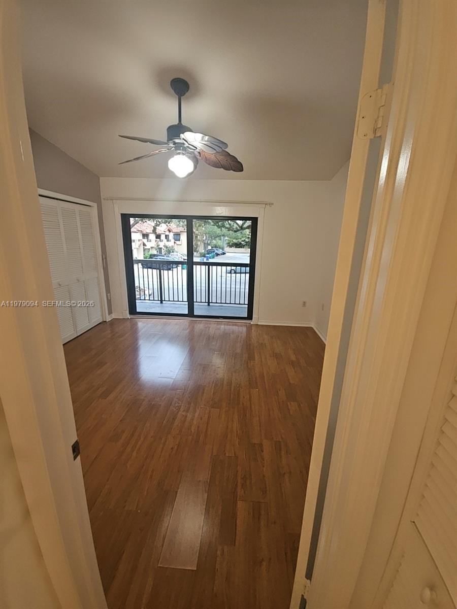 7870 Southwest 102nd Lane Miami, FL 33156 - Photo 25 of 41 wooden floor in an empty room with a window