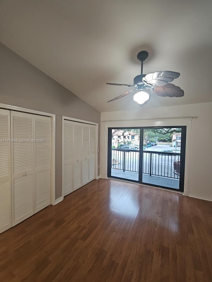 7870 Southwest 102nd Lane Miami, FL 33156 - Photo 26 of 41 a view of an empty room with wooden floor and a window