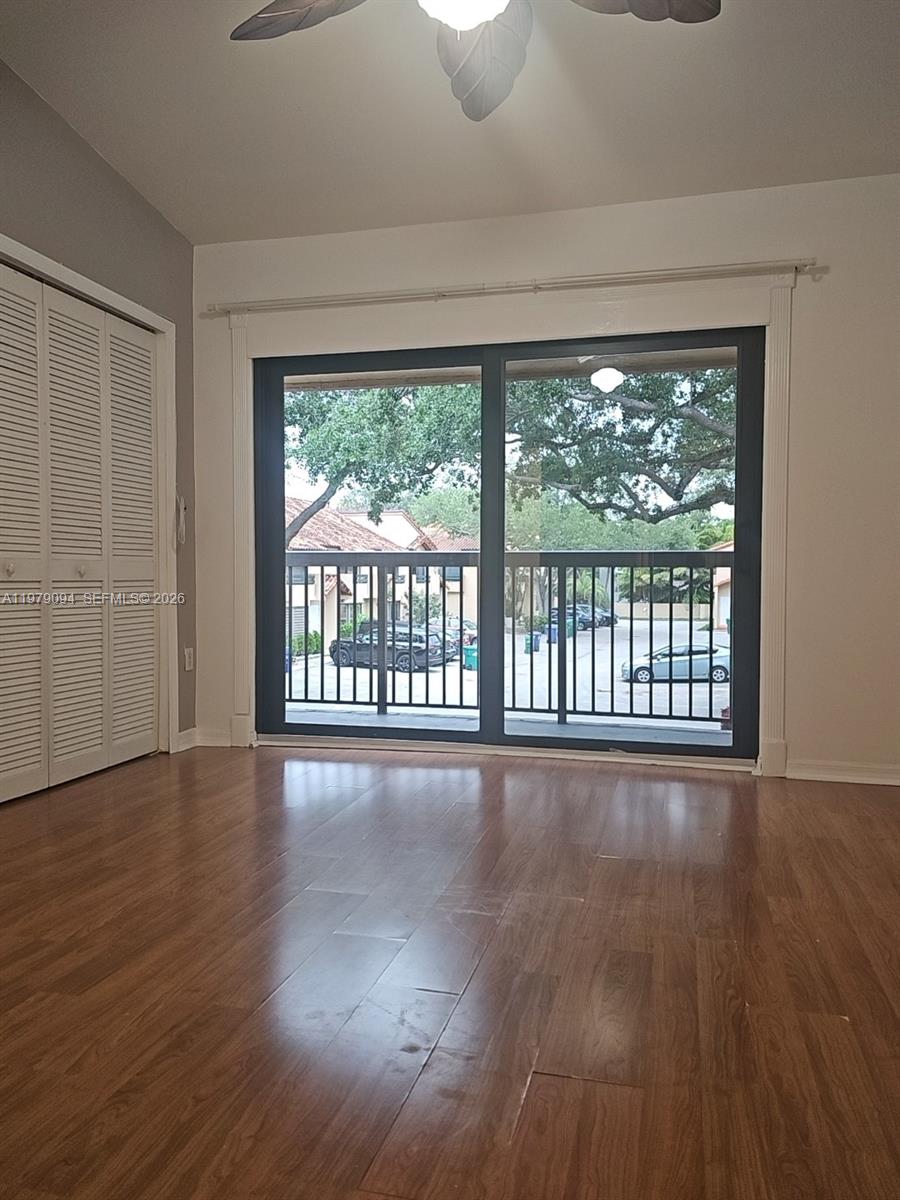 7870 Southwest 102nd Lane Miami, FL 33156 - Photo 37 of 41 a view of an empty room with wooden floor and a window