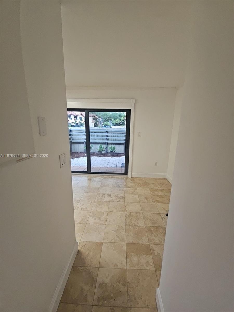 7870 Southwest 102nd Lane Miami, FL 33156 - Photo 7 of 41 a view of an empty room