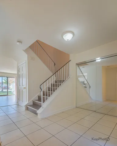 a view of staircase with white walls and white walls