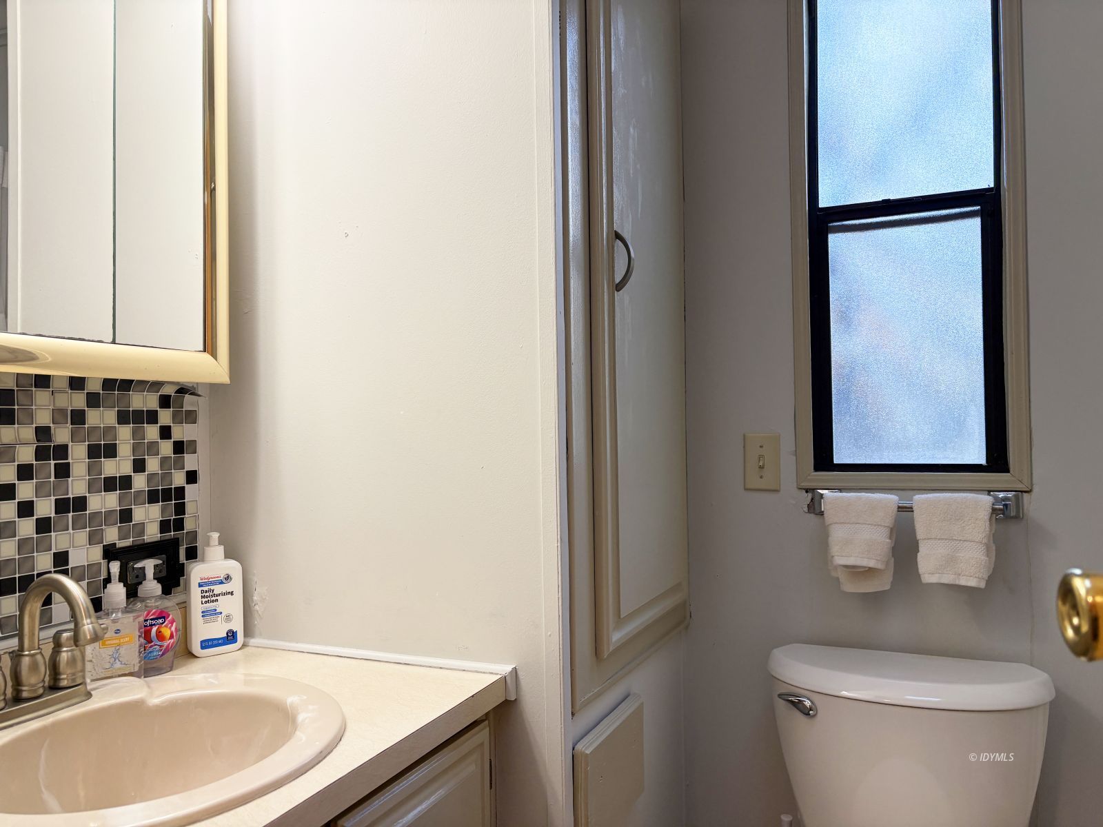 25955 Highway 243, Unit 1 Idyllwild, CA 92549 - Photo 19 of 33 a bathroom with a granite countertop sink and a toilet