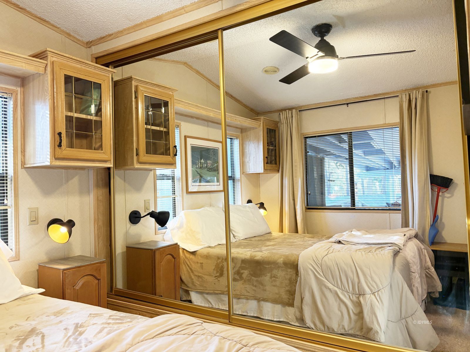 25955 Highway 243, Unit 1 Idyllwild, CA 92549 - Photo 20 of 33 a bedroom with a bed and a large window
