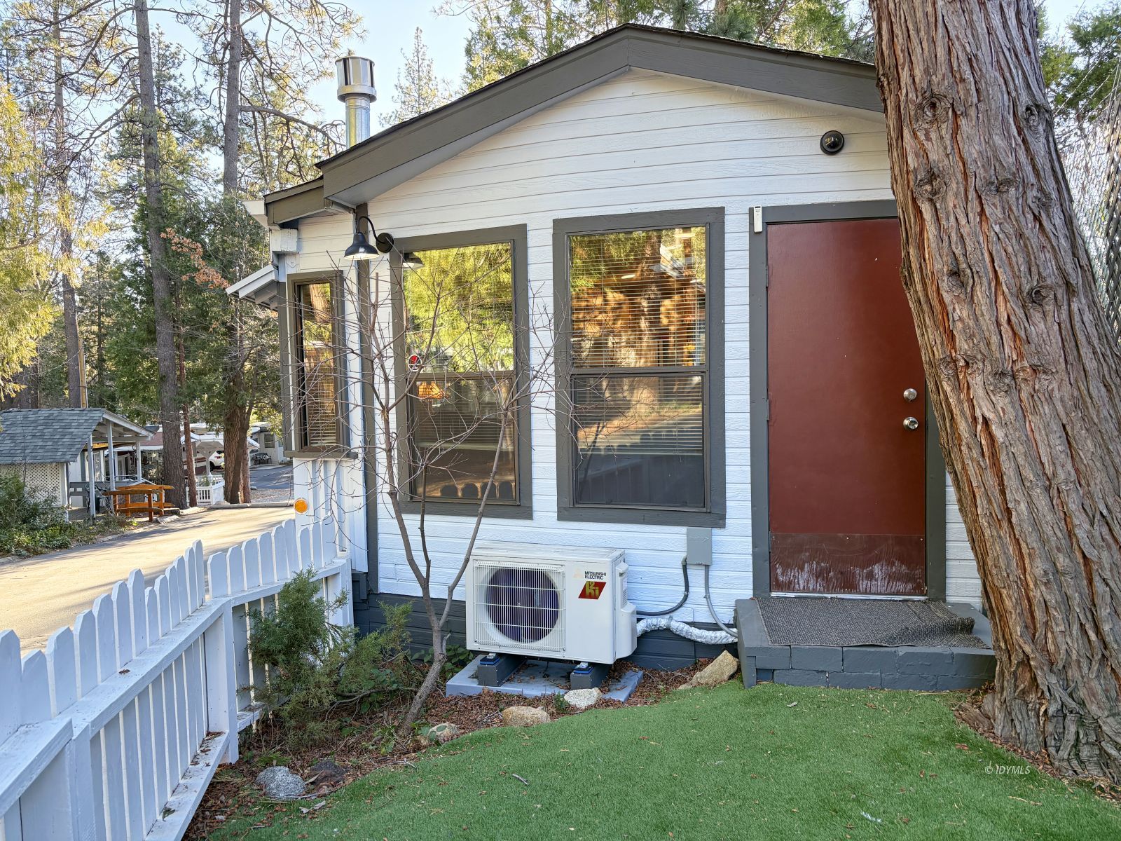 25955 Highway 243, Unit 1 Idyllwild, CA 92549 - Photo 28 of 33 a front view of a house with garden