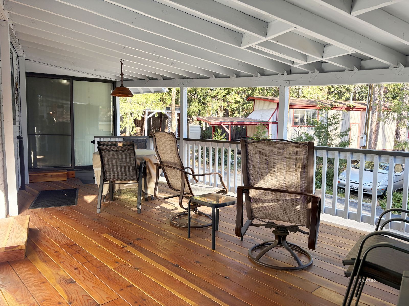 25955 Highway 243, Unit 1 Idyllwild, CA 92549 - Photo 29 of 33 a view of a patio with a table chairs and backyard