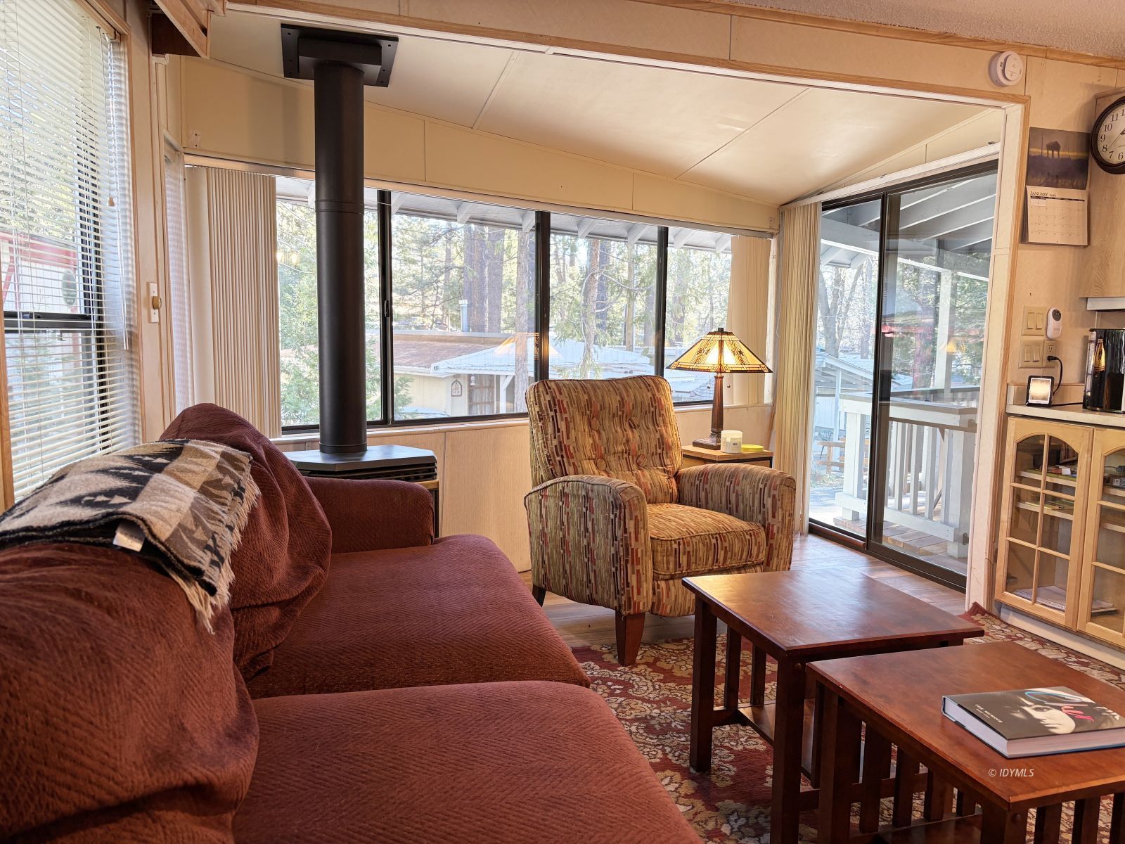 25955 Highway 243, Unit 1 Idyllwild, CA 92549 - Photo 3 of 33 a bedroom with furniture and a large window