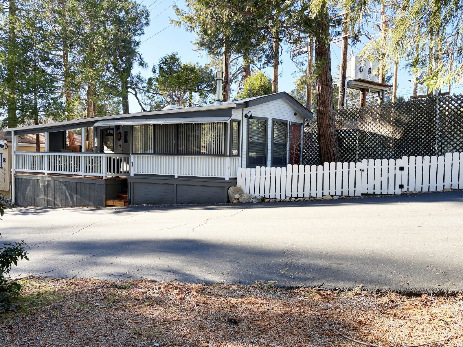 25955 Highway 243, Unit 1 Idyllwild, CA 92549 - Photo 33 of 33 a front view of a house with a yard