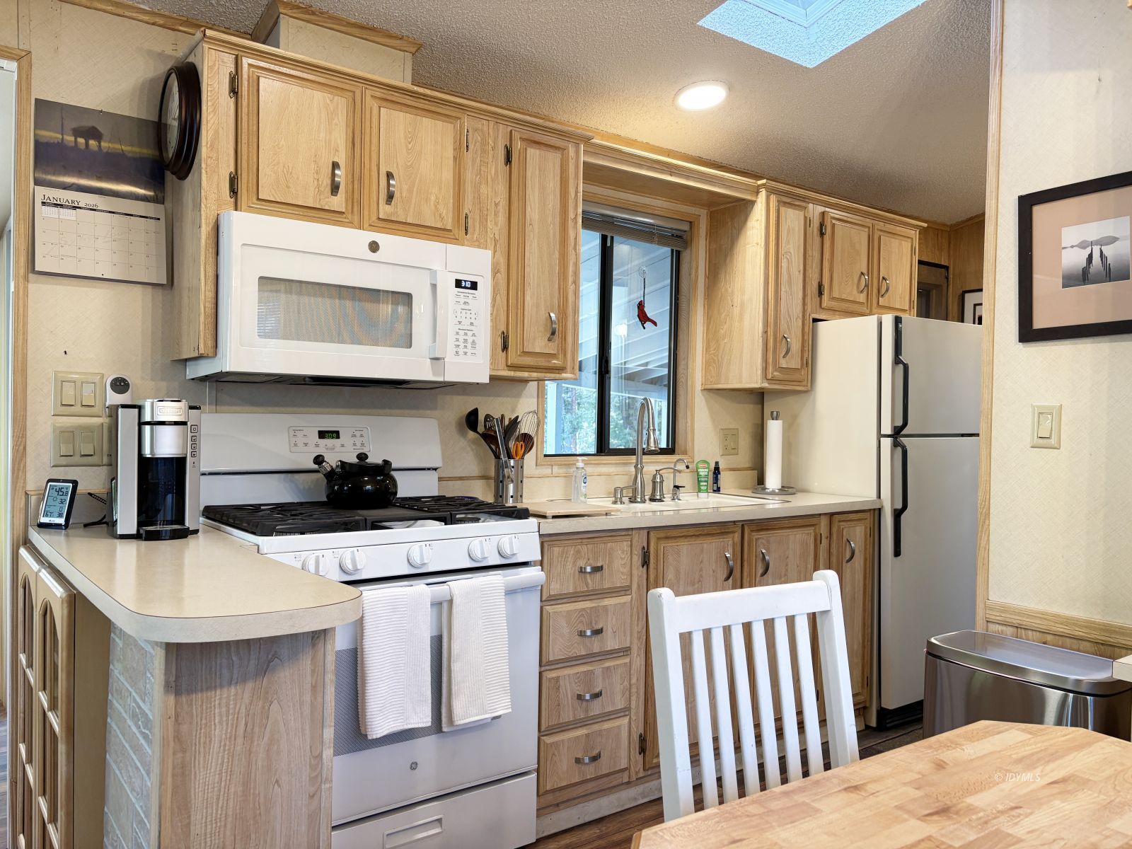 25955 Highway 243, Unit 1 Idyllwild, CA 92549 - Photo 10 of 33 a kitchen with stainless steel appliances a stove a sink and a refrigerator