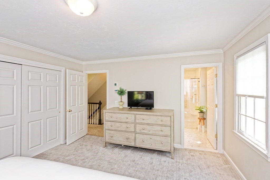 16 Bridle Path Shrewsbury, MA 01545 - Photo 13 of 42 a room with a bed and furniture