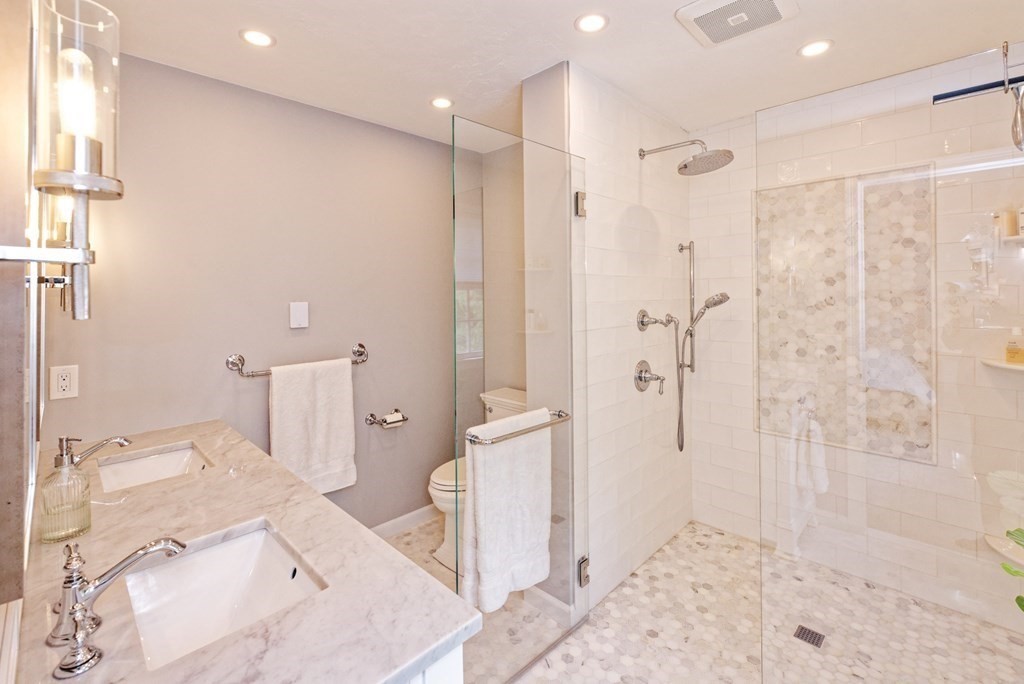 16 Bridle Path Shrewsbury, MA 01545 - Photo 15 of 42 a bathroom with a shower and a sink