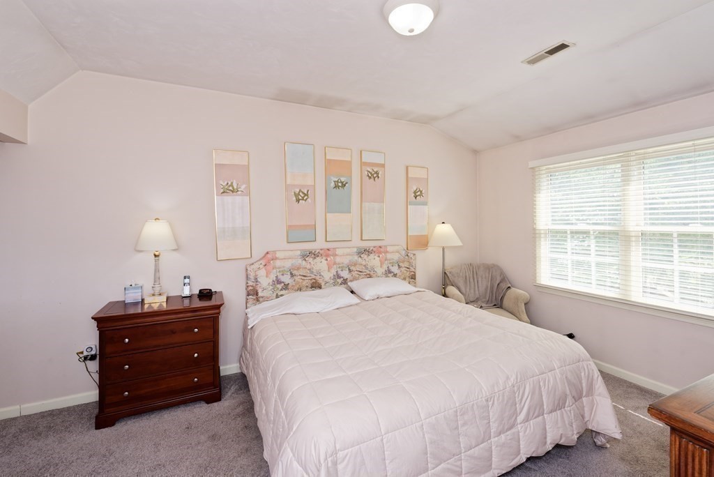 16 Bridle Path Shrewsbury, MA 01545 - Photo 24 of 42 a bedroom with a bed and a window