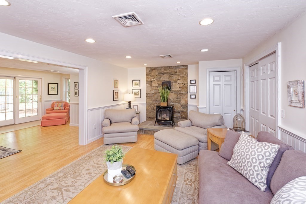 16 Bridle Path Shrewsbury, MA 01545 - Photo 28 of 42 a living room with furniture and a large window