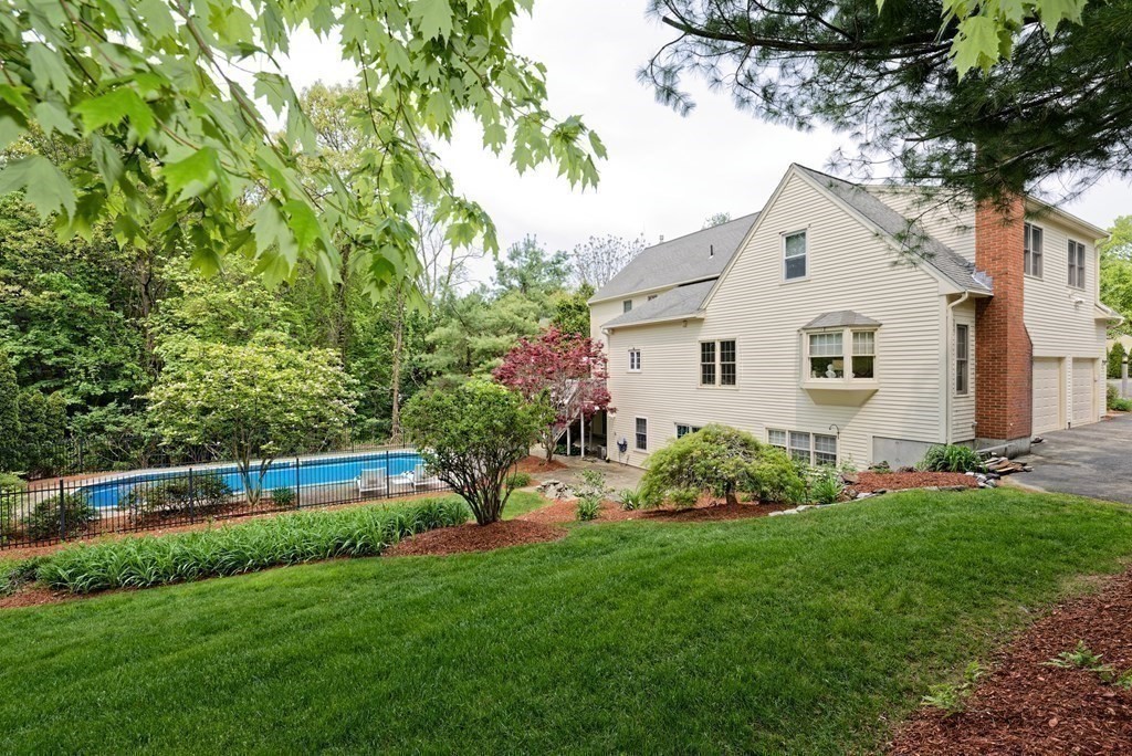 16 Bridle Path Shrewsbury, MA 01545 - Photo 41 of 42 a view of backyard with a garden and plants