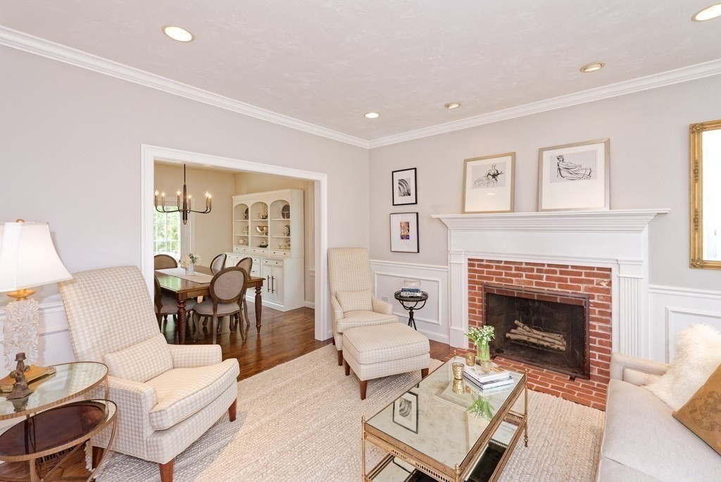 16 Bridle Path Shrewsbury, MA 01545 - Photo 9 of 42 a living room with furniture and a fireplace