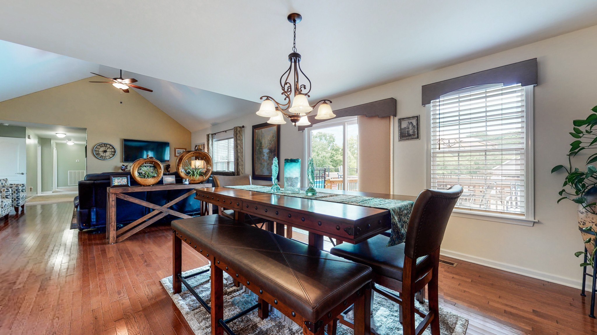 1439 Cliff Amos Road Spring Hill, TN 37174 - Photo 11 of 64 a view of a dining room with furniture window and wooden floor