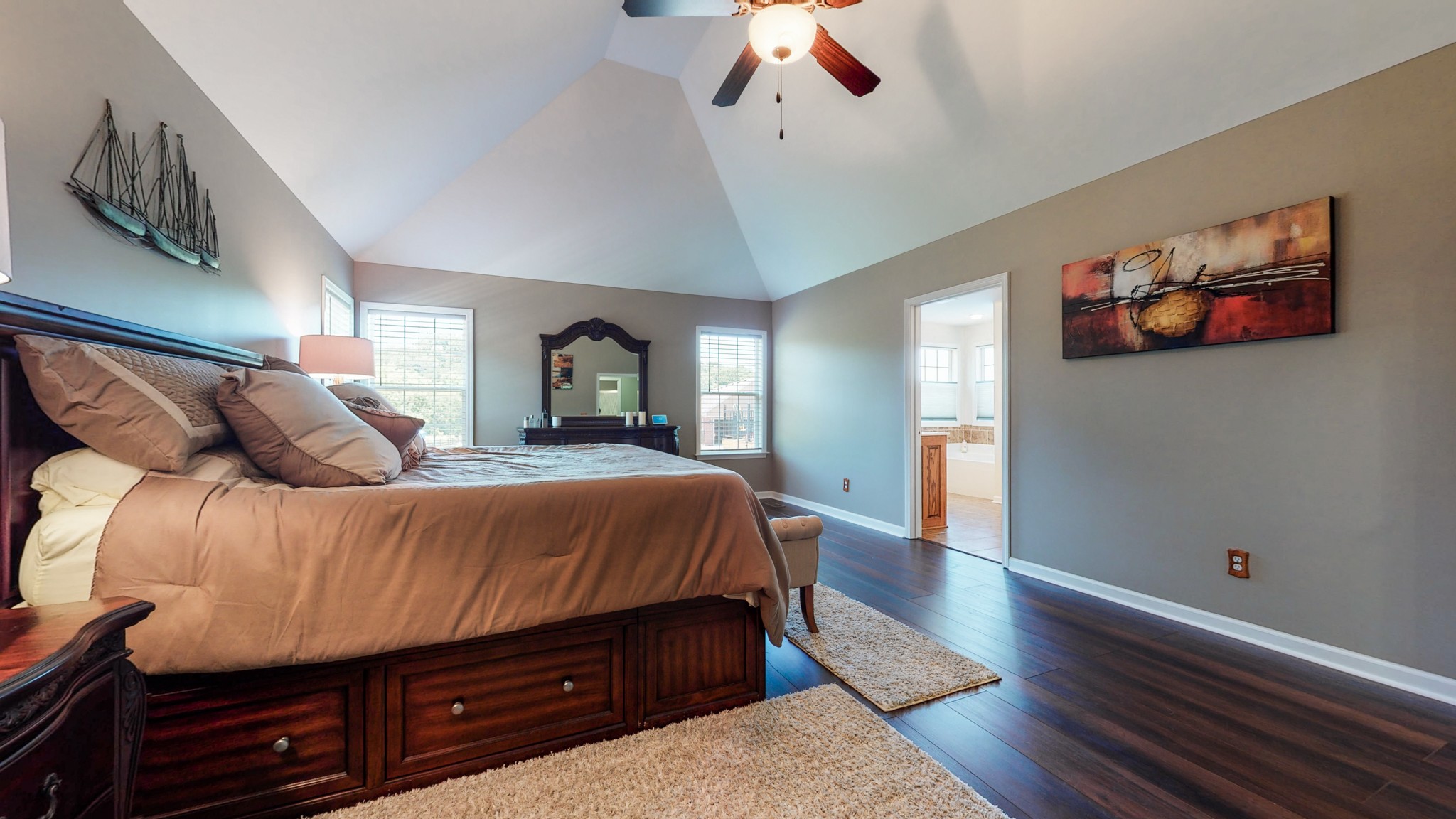 1439 Cliff Amos Road Spring Hill, TN 37174 - Photo 17 of 64 a bedroom with a bed and wooden floor