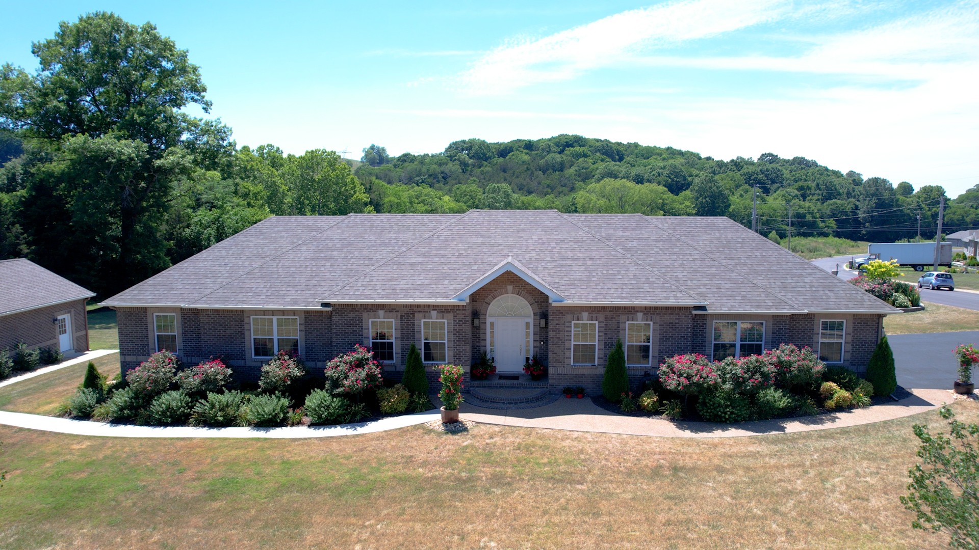 1439 Cliff Amos Road Spring Hill, TN 37174 - Photo 2 of 64 a front view of a house with a yard