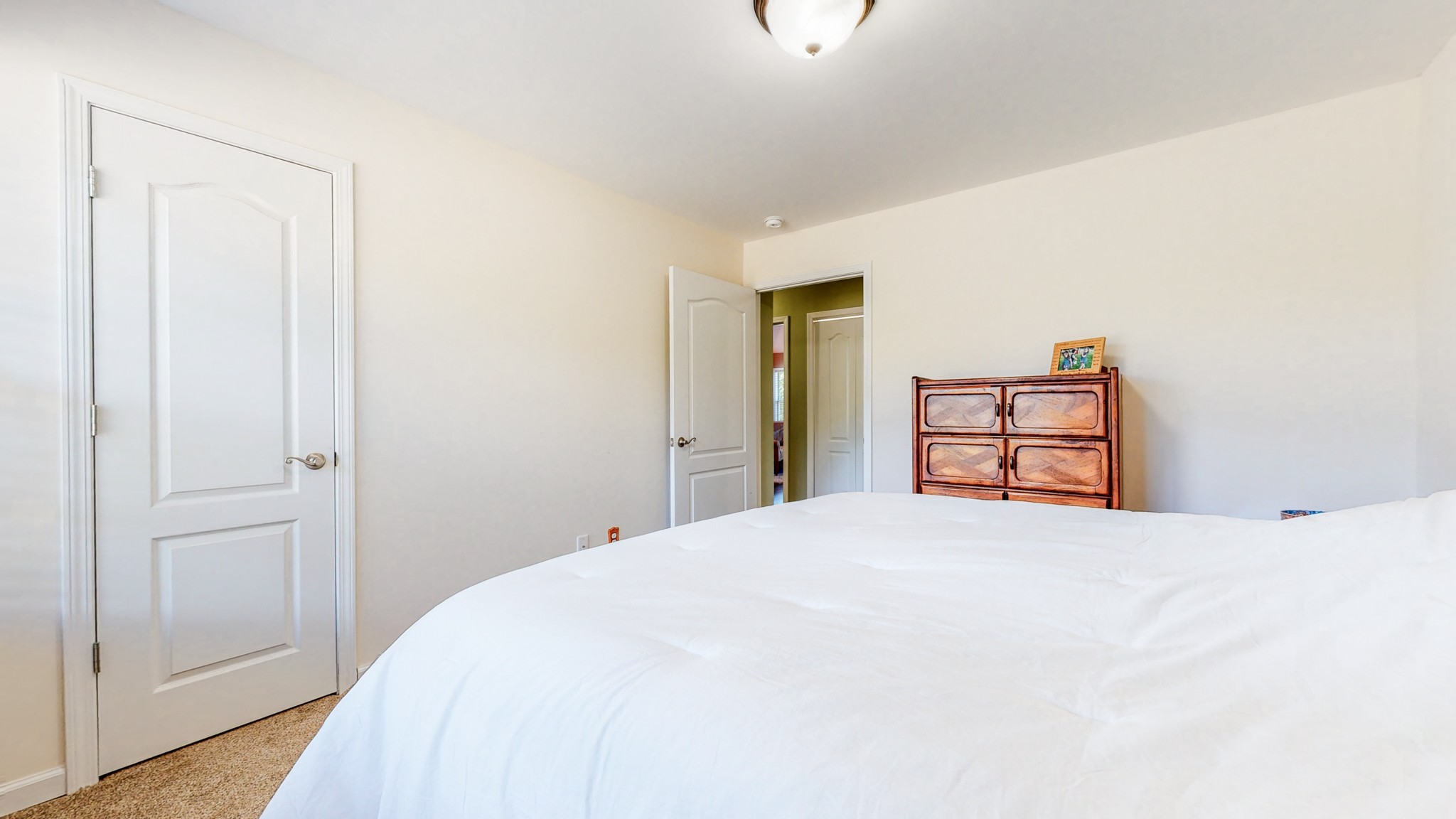 1439 Cliff Amos Road Spring Hill, TN 37174 - Photo 24 of 64 a bedroom with a bed and a closet