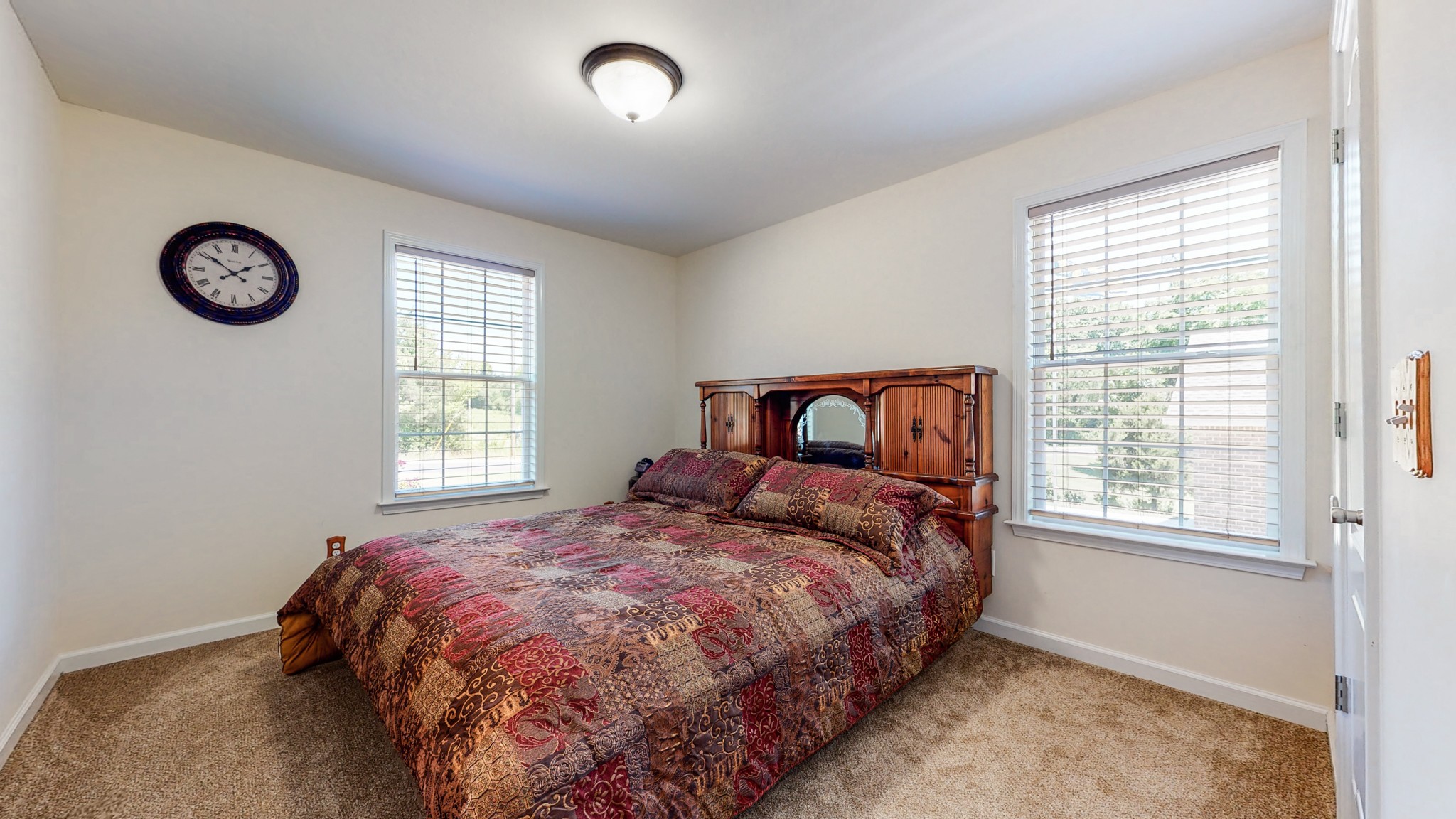1439 Cliff Amos Road Spring Hill, TN 37174 - Photo 28 of 64 a bedroom with a bed and a window