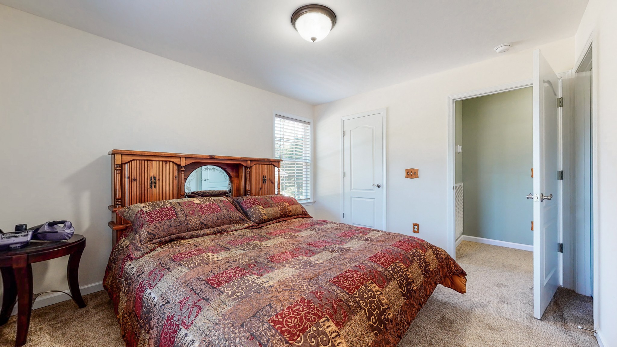 1439 Cliff Amos Road Spring Hill, TN 37174 - Photo 29 of 64 a bedroom with a bed and a window