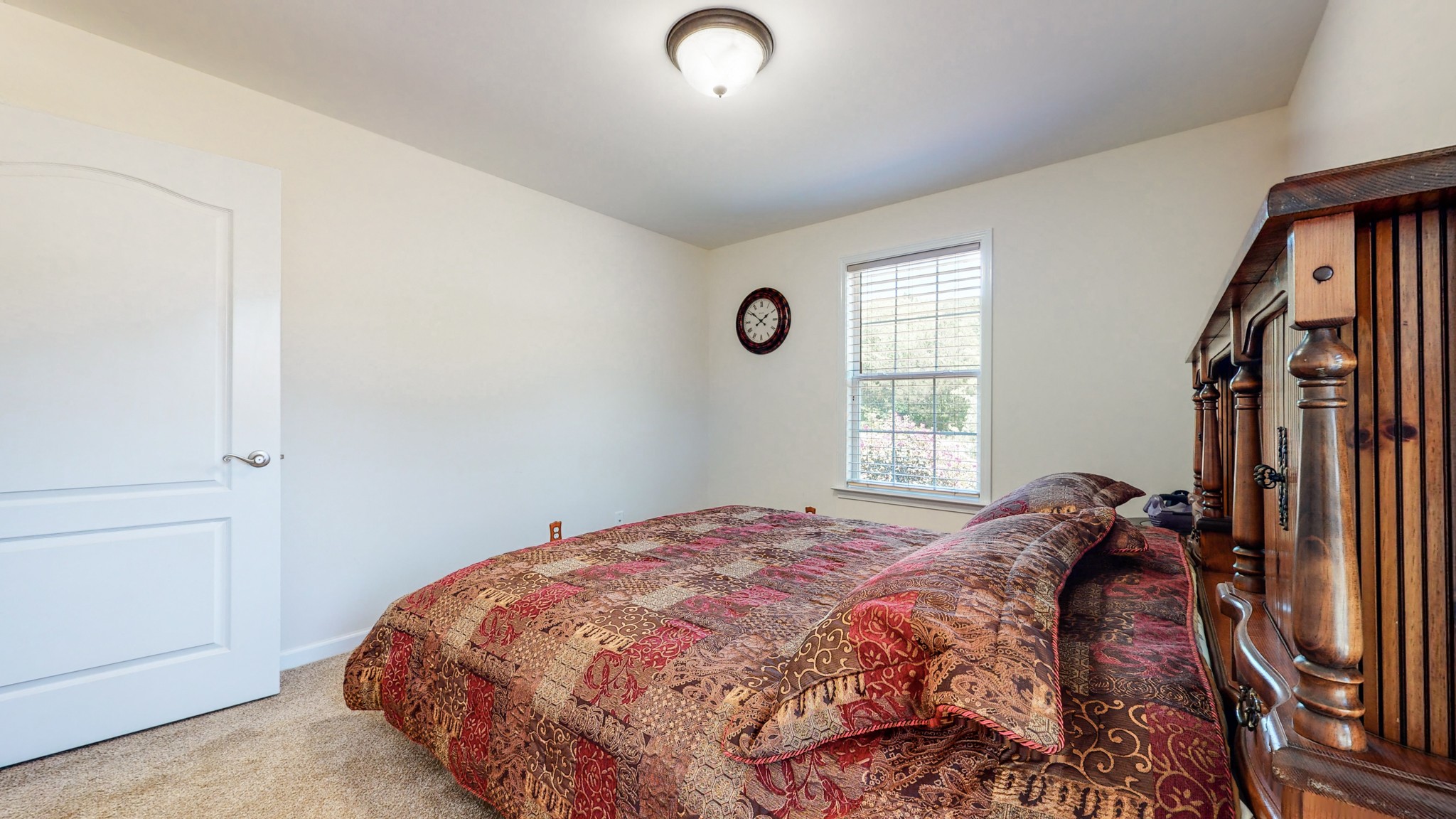1439 Cliff Amos Road Spring Hill, TN 37174 - Photo 30 of 64 a bedroom with a bed and a window