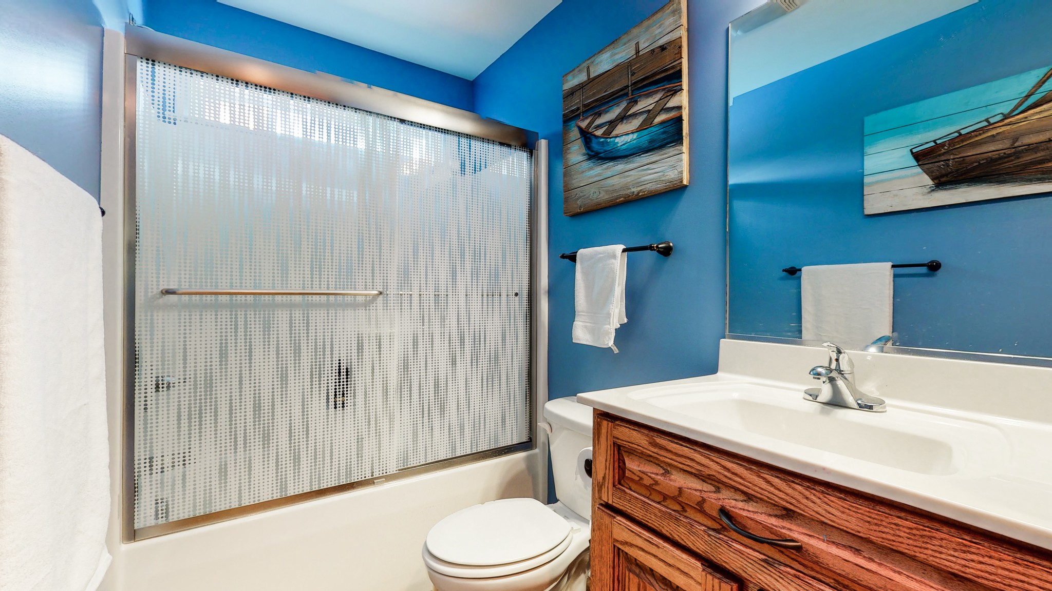 1439 Cliff Amos Road Spring Hill, TN 37174 - Photo 32 of 64 a bathroom with a sink a toilet and shower