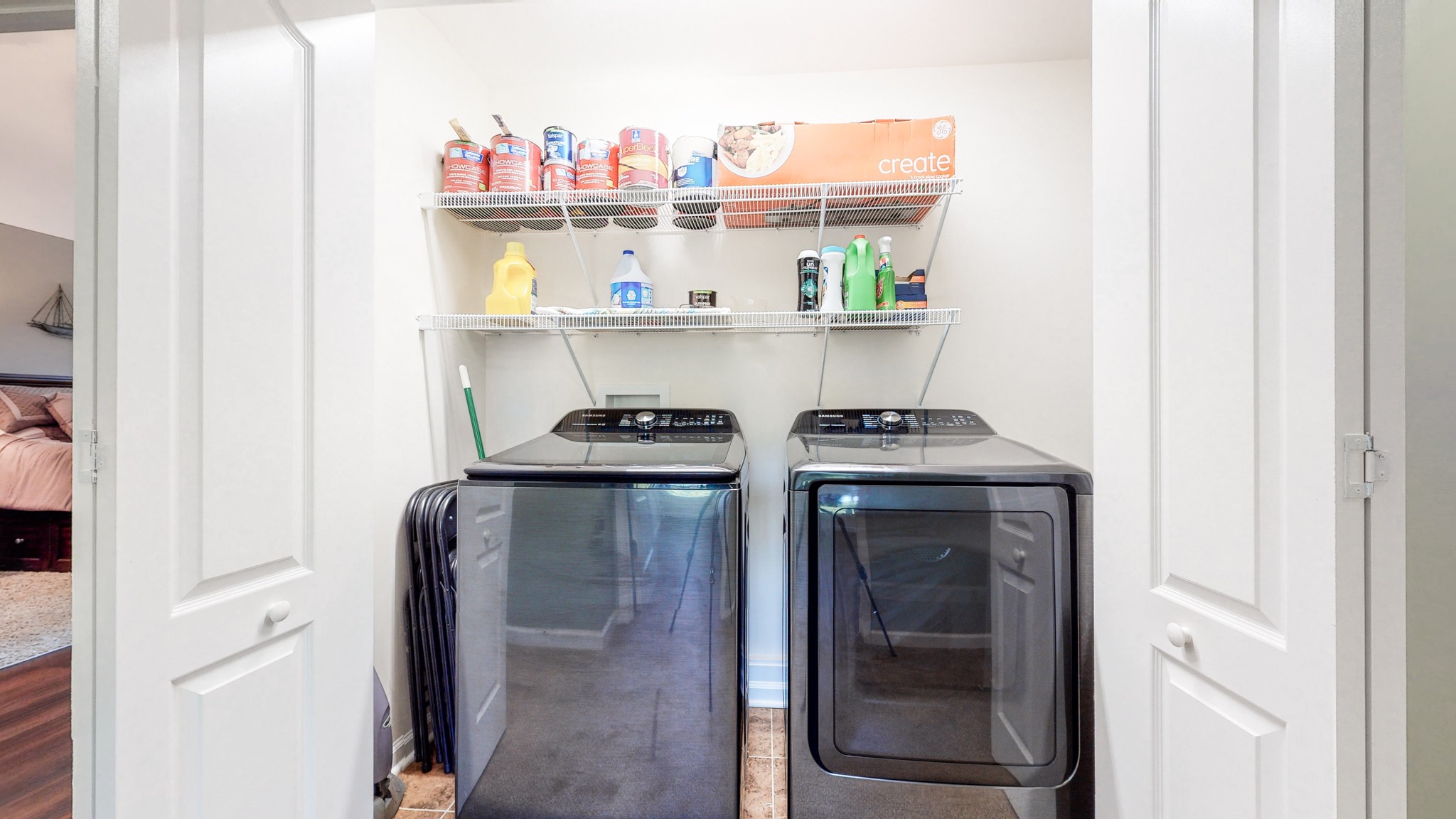 1439 Cliff Amos Road Spring Hill, TN 37174 - Photo 36 of 64 a kitchen with a refrigerator and a stove