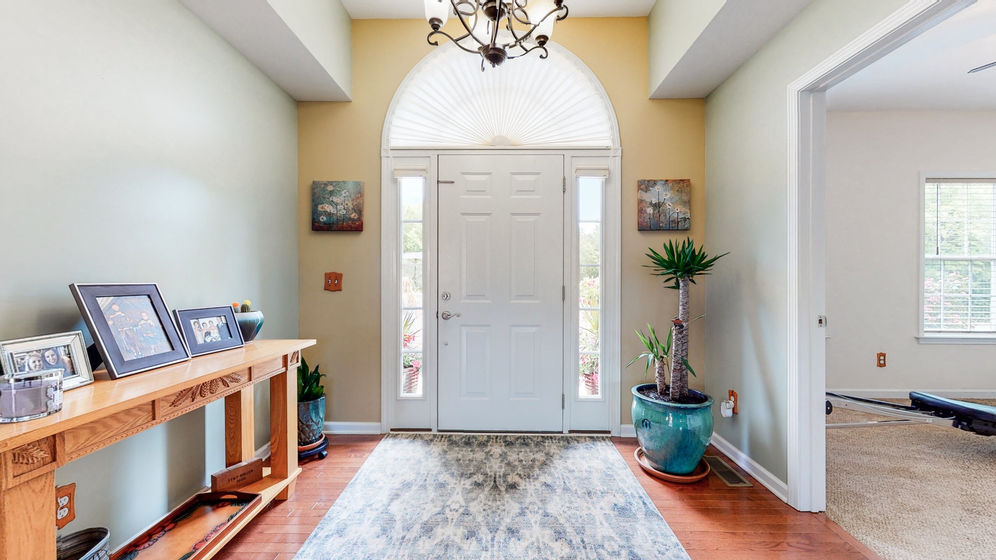 1439 Cliff Amos Road Spring Hill, TN 37174 - Photo 37 of 64 a very nice looking room with a window and wooden floor