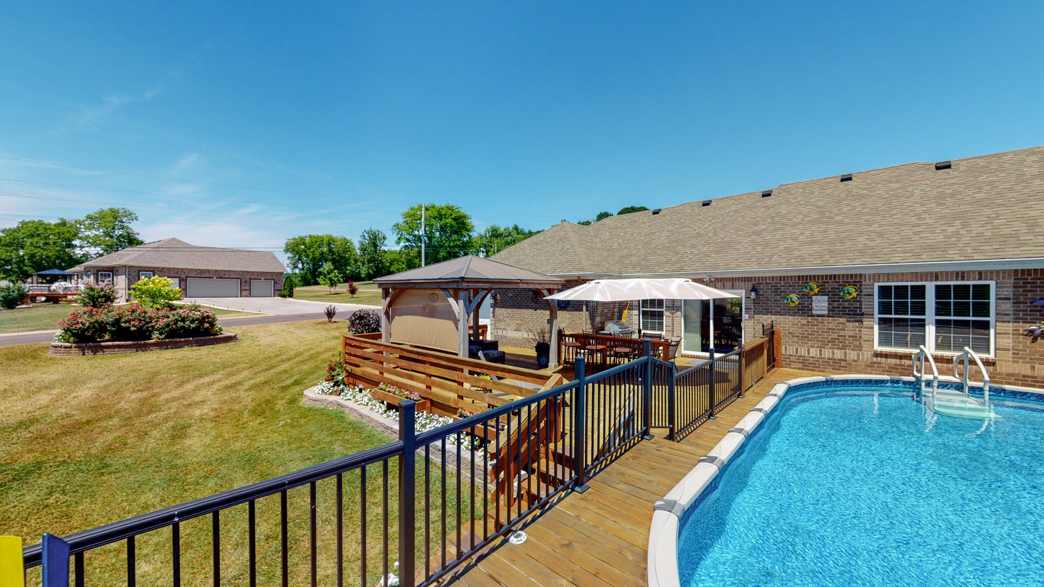 1439 Cliff Amos Road Spring Hill, TN 37174 - Photo 46 of 64 a view of a house with swimming pool and sitting area