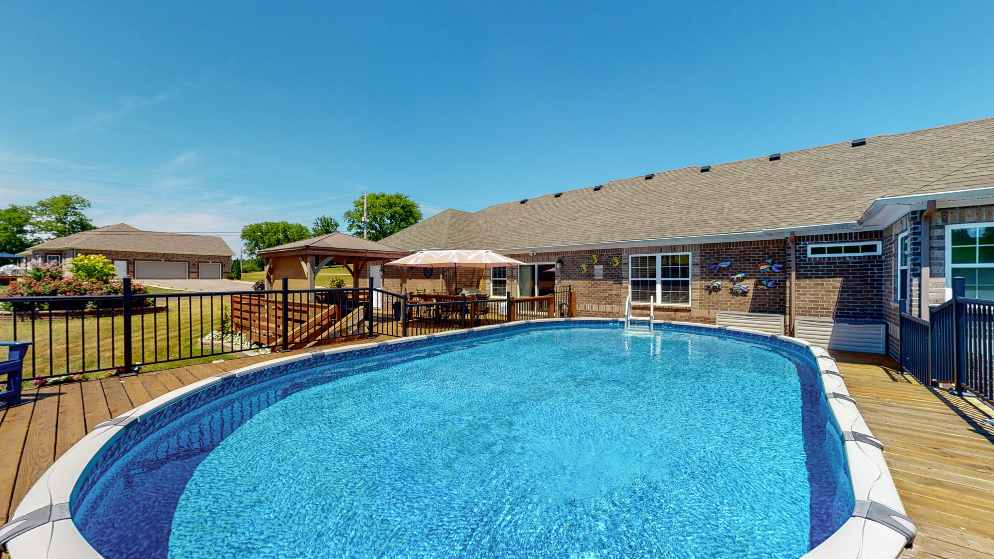 1439 Cliff Amos Road Spring Hill, TN 37174 - Photo 47 of 64 a view of a house with swimming pool and porch
