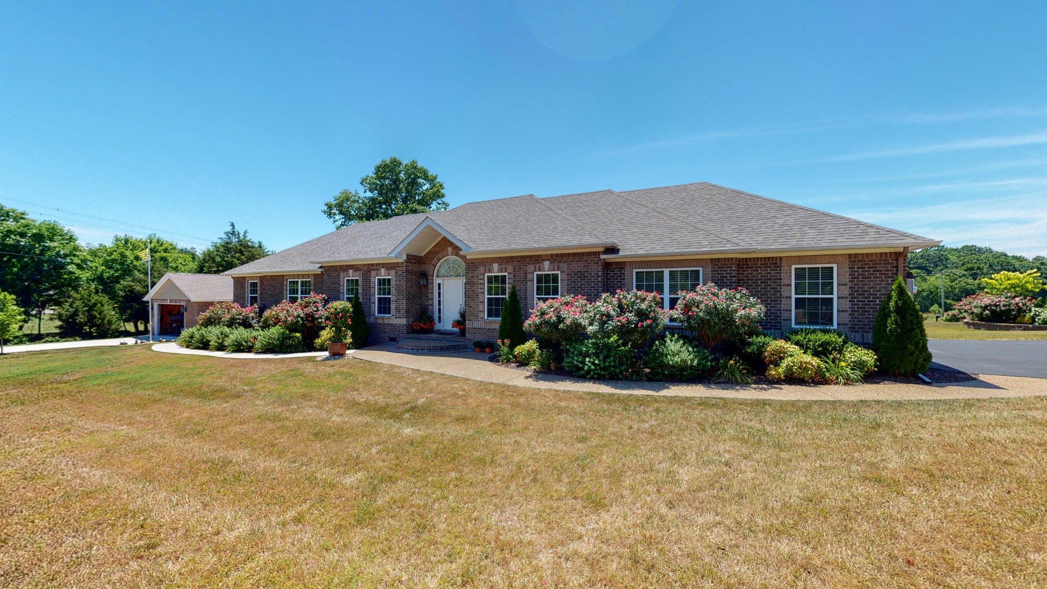 1439 Cliff Amos Road Spring Hill, TN 37174 - Photo 56 of 64 a front view of a house with a yard