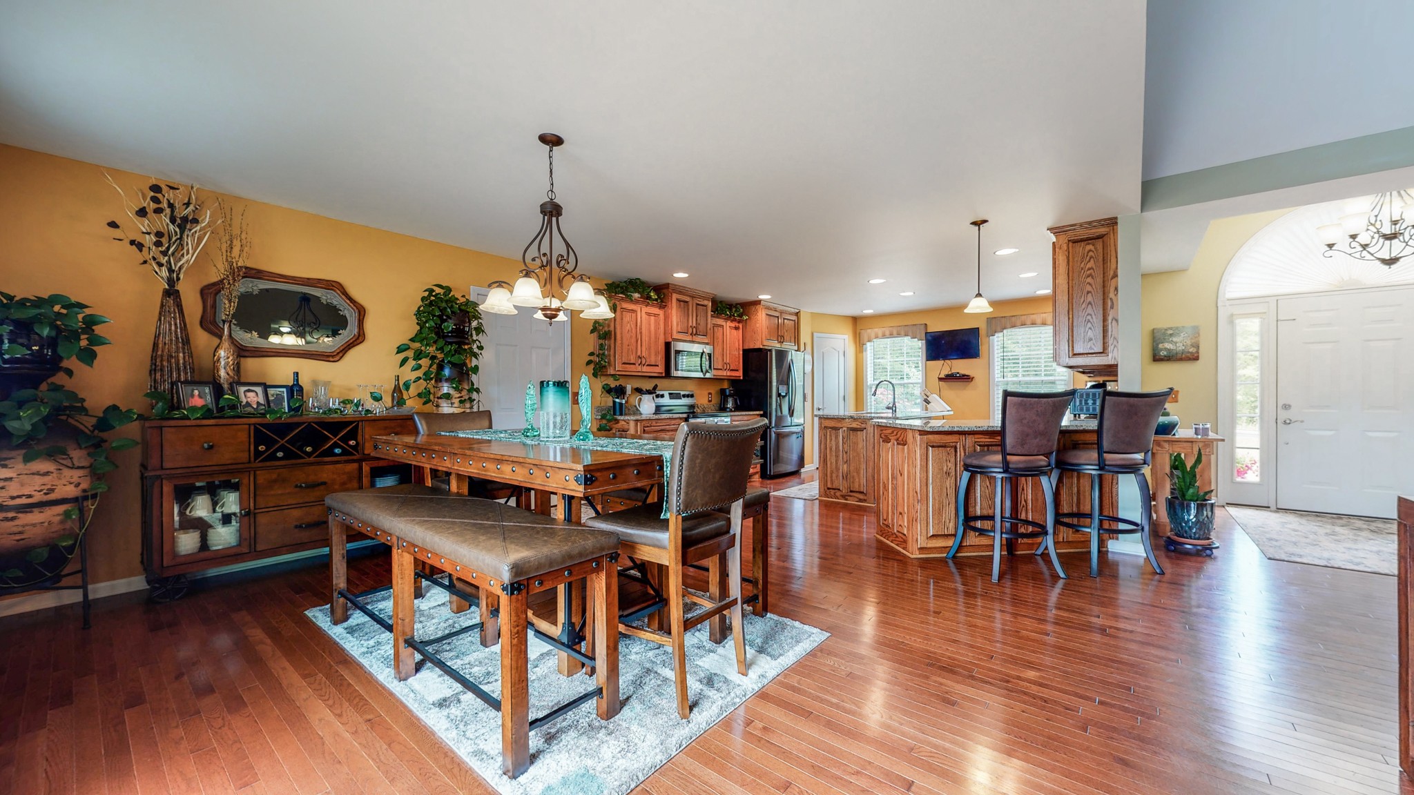 1439 Cliff Amos Road Spring Hill, TN 37174 - Photo 8 of 64 a view of a dining room with furniture and wooden floor