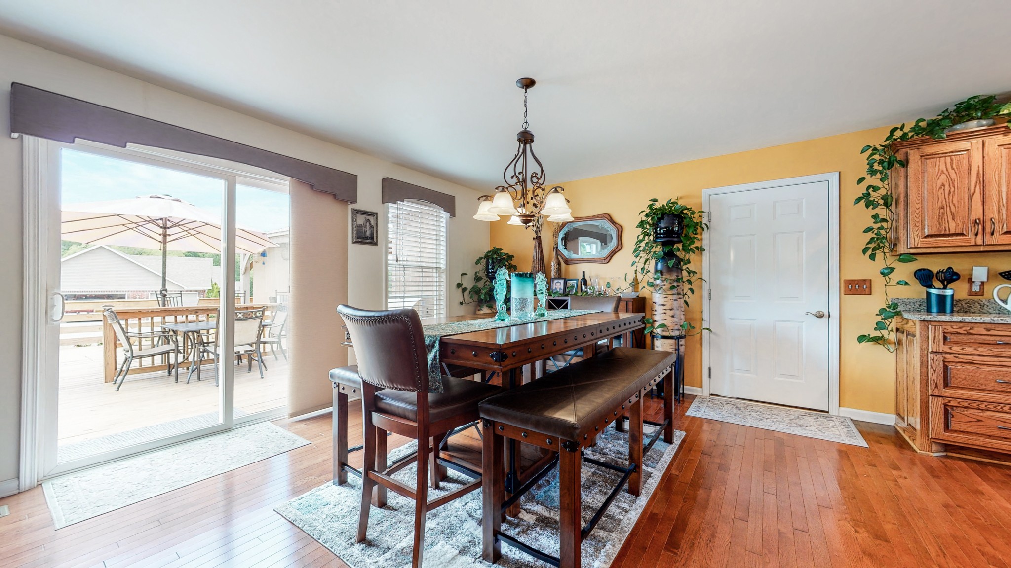 1439 Cliff Amos Road Spring Hill, TN 37174 - Photo 9 of 64 a view of a dining room with furniture window and wooden floor