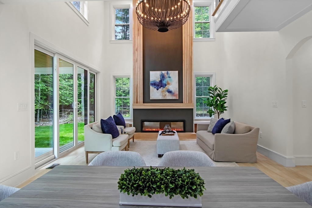 293 Cross Street Norwell, MA 02061 - Photo 11 of 38 a living room with furniture and a potted plant