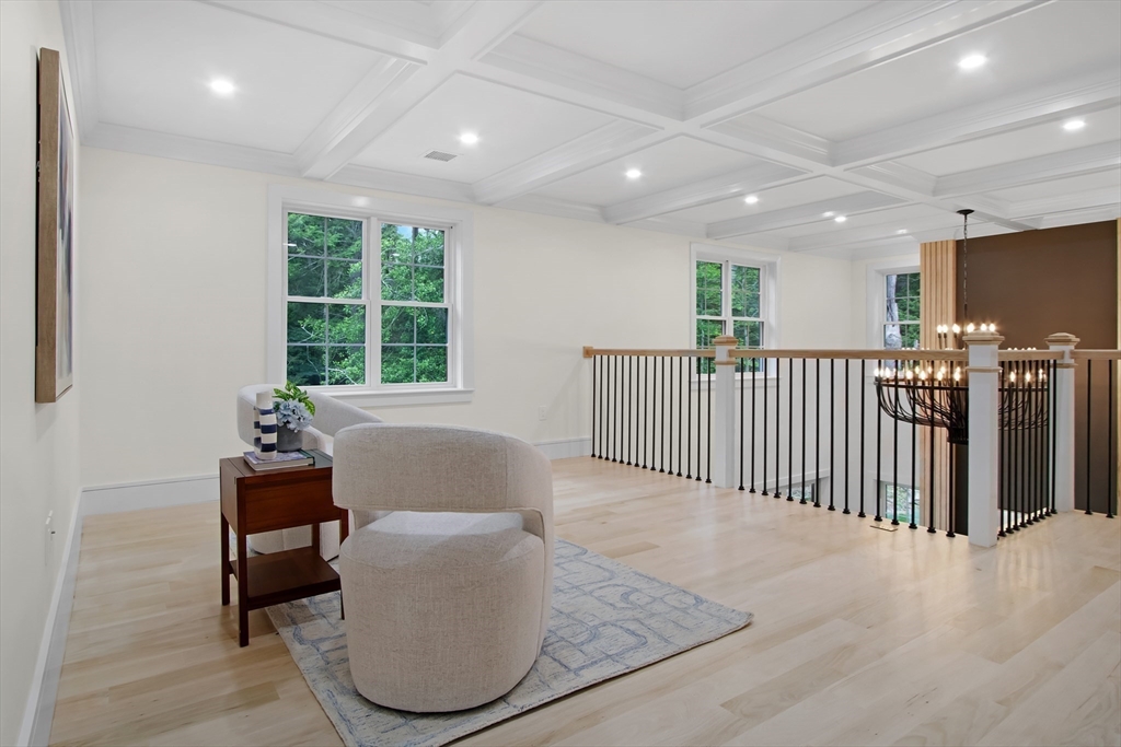 293 Cross Street Norwell, MA 02061 - Photo 17 of 38 a living room with furniture and a window