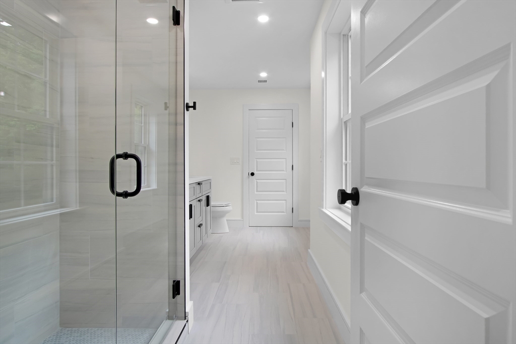 293 Cross Street Norwell, MA 02061 - Photo 27 of 38 a bathroom with a shower